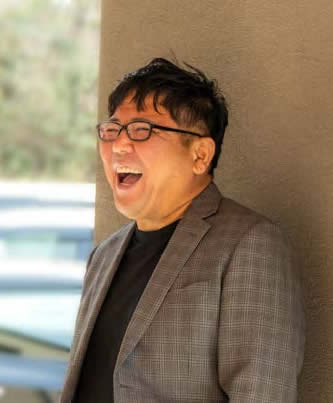 田尻 忠義 氏